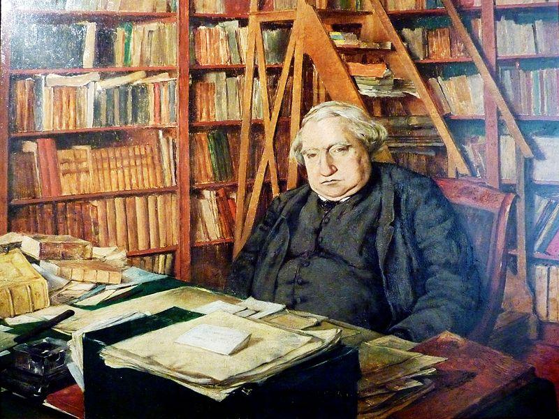  Ernest Renan dans son bureau au Collège de France à Paris, par Henri Moreau, sans doute dans les années 1920 (Photo domaine public).